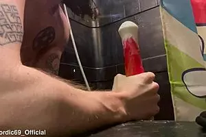Young bisexual boy tries deep throat with a big cock toy in the form of a horse
